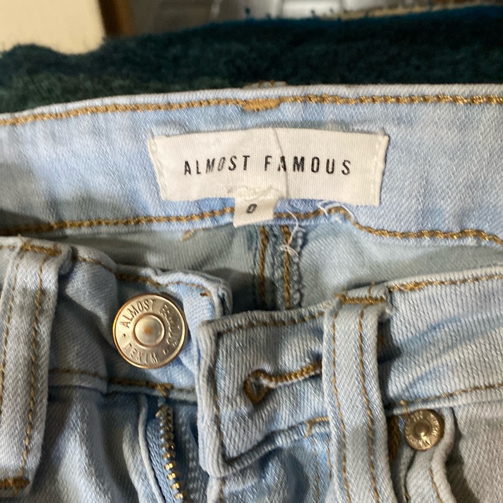 Almost Famous jeans. Size 0 distressed. Light blue